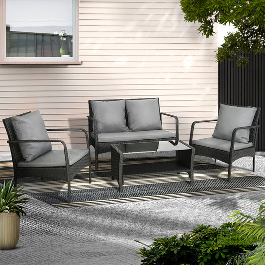 4-piece black wicker outdoor sofa set with glass table