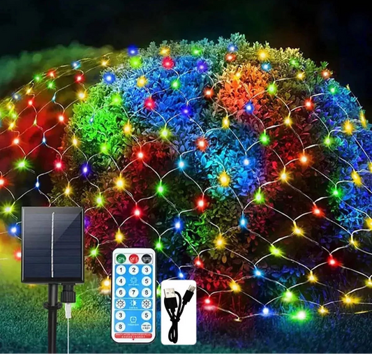 Solar LED net fairy lights on a garden bush