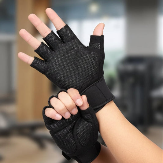 Black glove with detailed features on a blurred indoor background