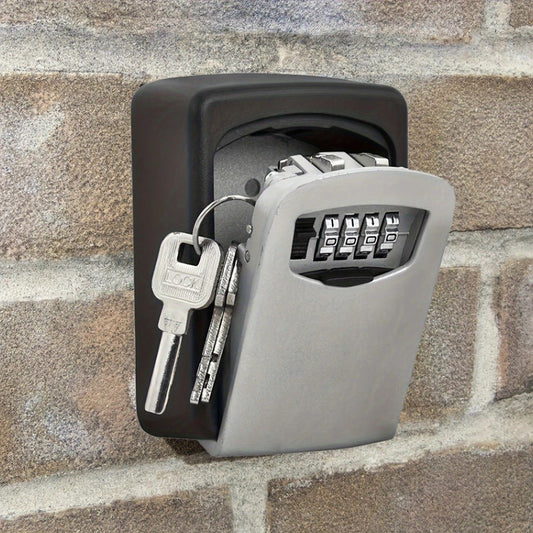 Key lock box with keys attached to a brick wall