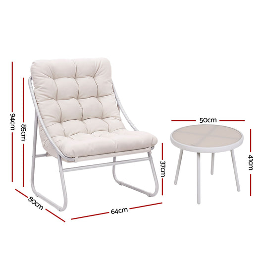Outdoor bistro set with two chairs and a glass-top table on a balcony
