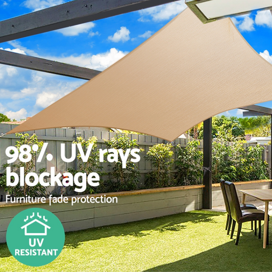 Sand shade sail sun canopy over a patio