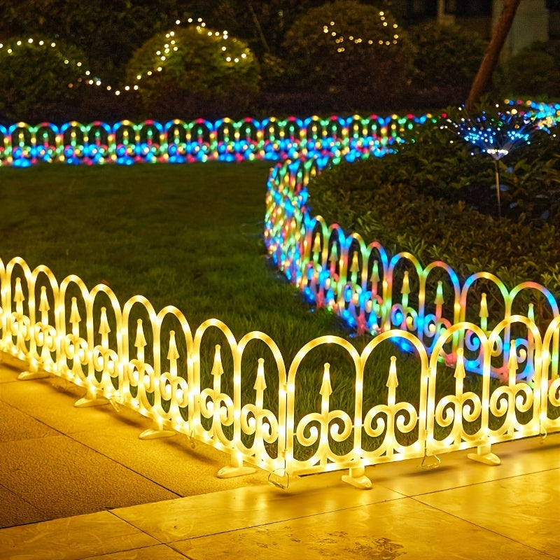 Colourful solar fence lights decorating a garden
