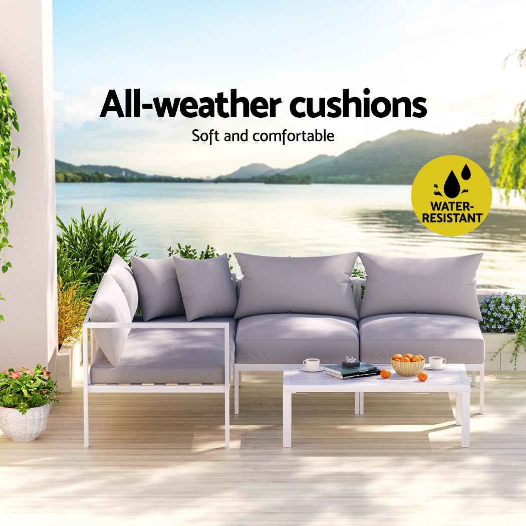 Modular outdoor sofa set arranged on a patio