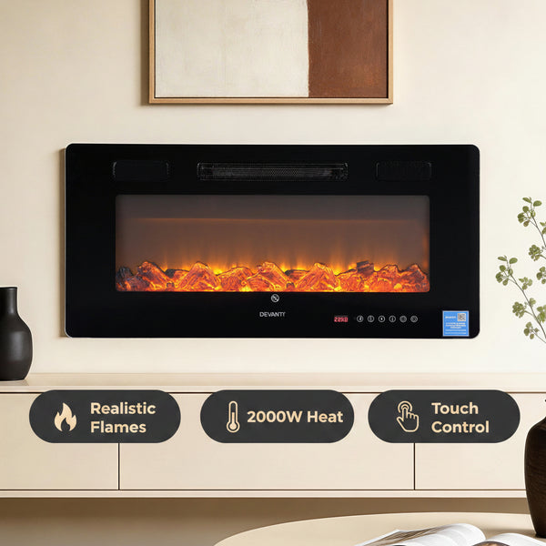 Electric fireplace insert on a wall above a white cabinet with decorative elements.