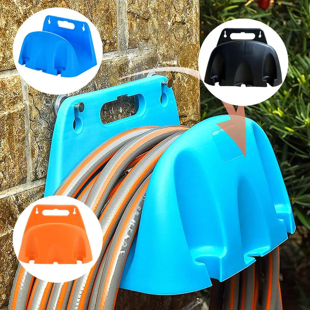 Blue hose reel with coiled hose against a stone wall