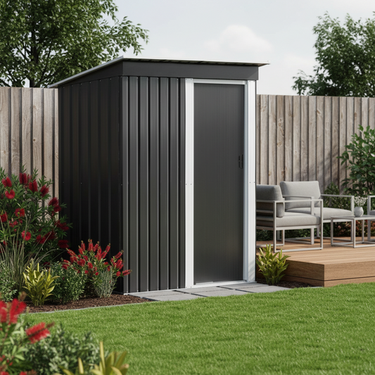 Black metal garden shed with white door in a backyard setting