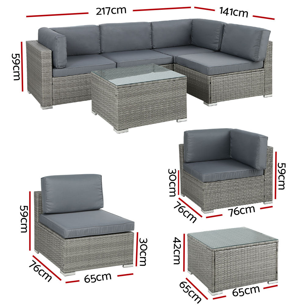 Outdoor wicker lounge setting with corner sofas and single sofas