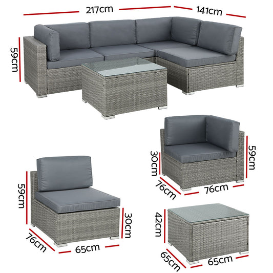 Outdoor wicker lounge setting with corner sofas and single sofas