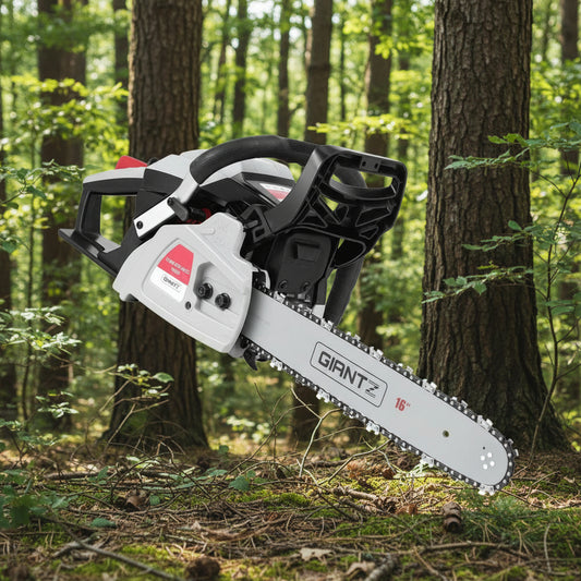 Giant Z chainsaw on a forest floor with trees in the background