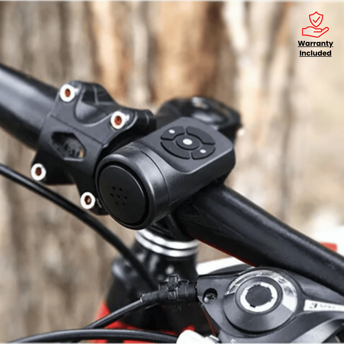 Close-up of a bicycle handlebar with control buttons and a blurred background
