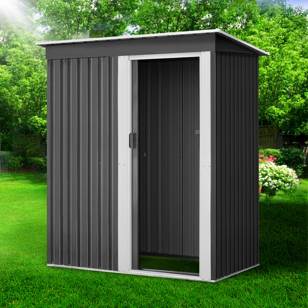 Grey galvanised steel metal garden shed with sliding door