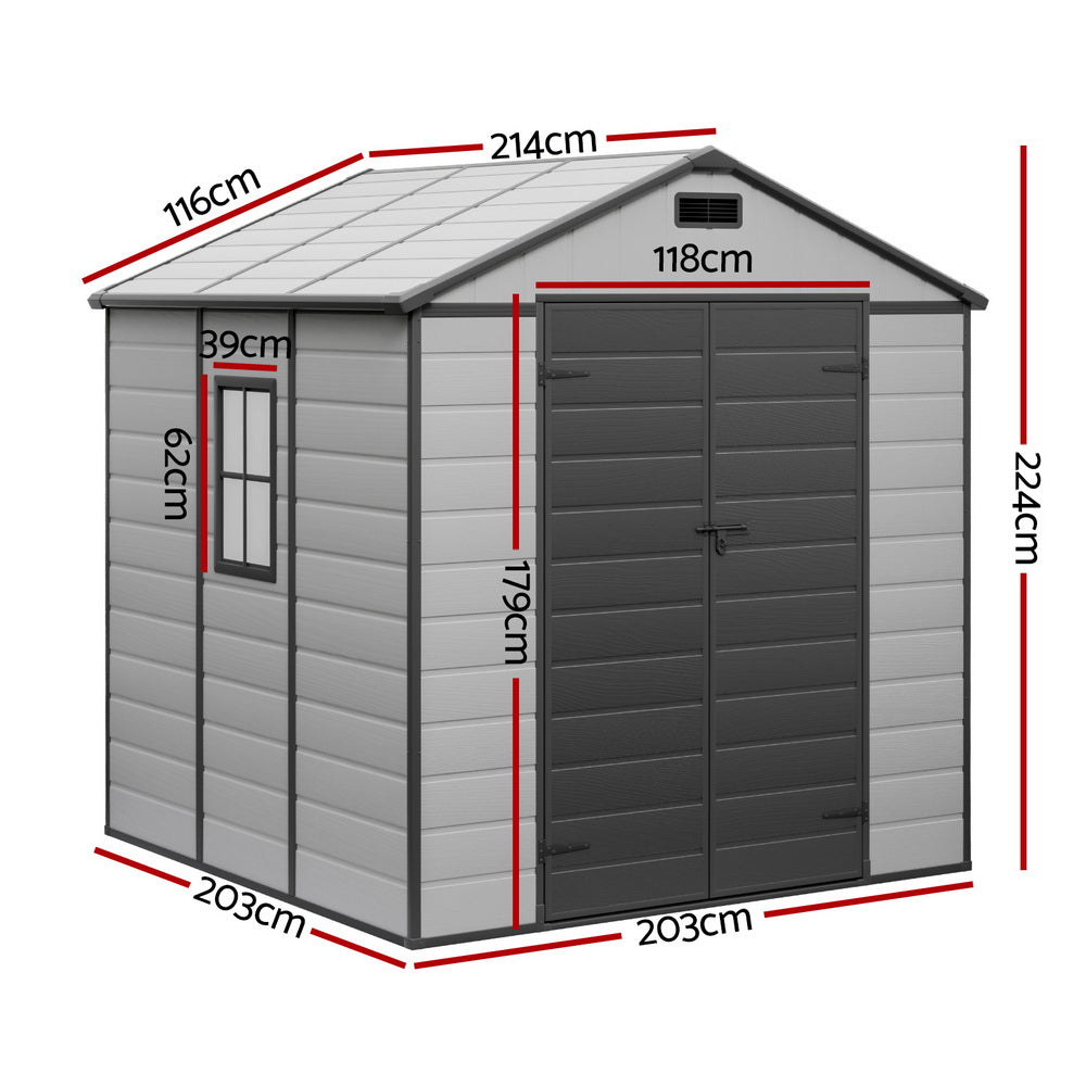 Walk-in garden shed shown in a backyard for outdoor storage