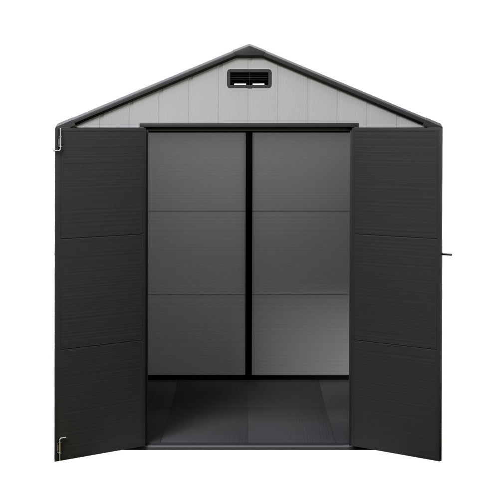 Double hinged doors of the large walk-in shed open