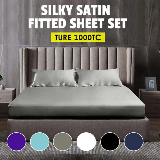 Gray satin fitted sheet set on a bed with color swatches below.
