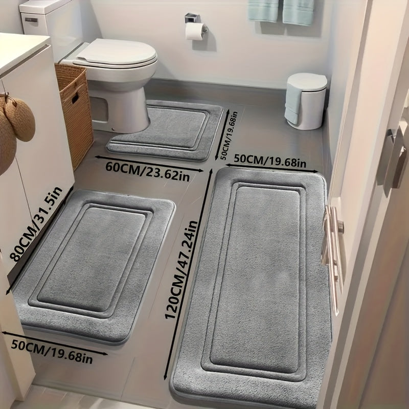 Grey bathroom rug set laid out