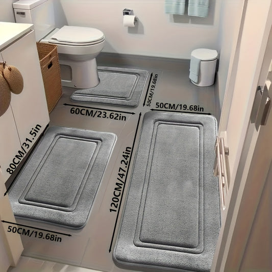 Grey bathroom rug set laid out