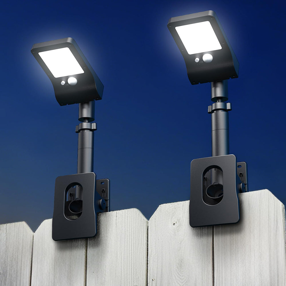 Clip-on solar motion light with 60 LEDs on a fence