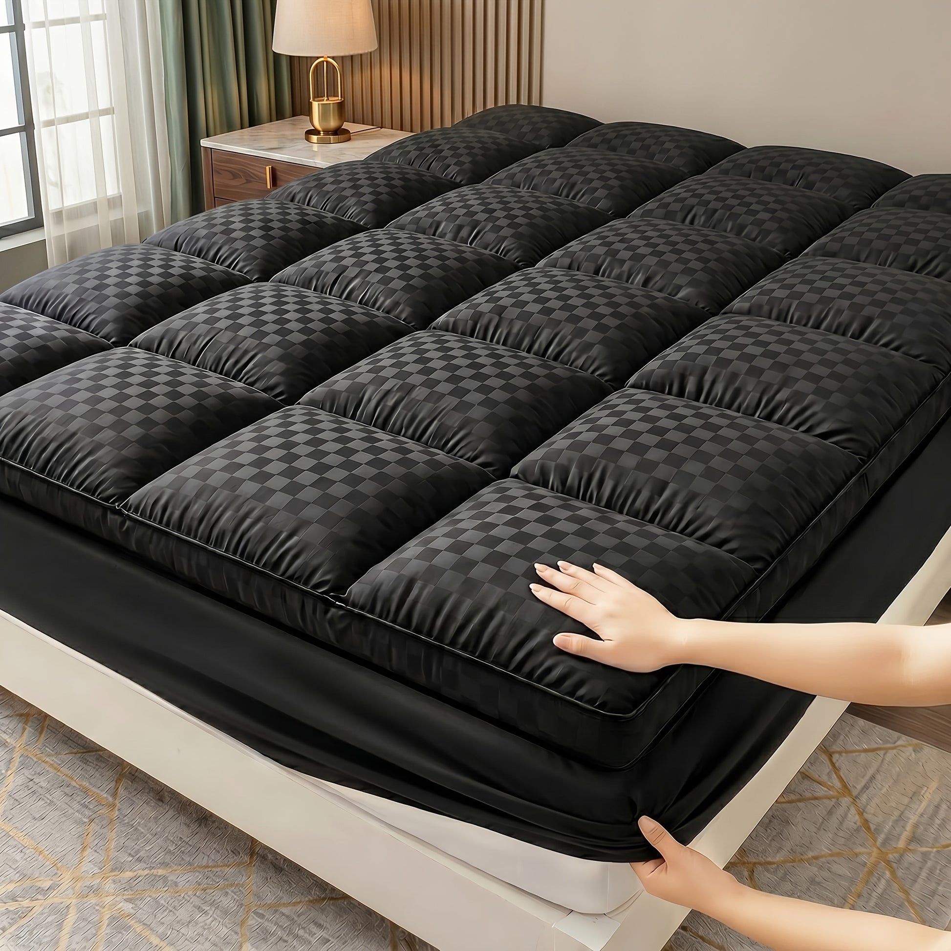 Cloud-like mattress protector shown on a made bed