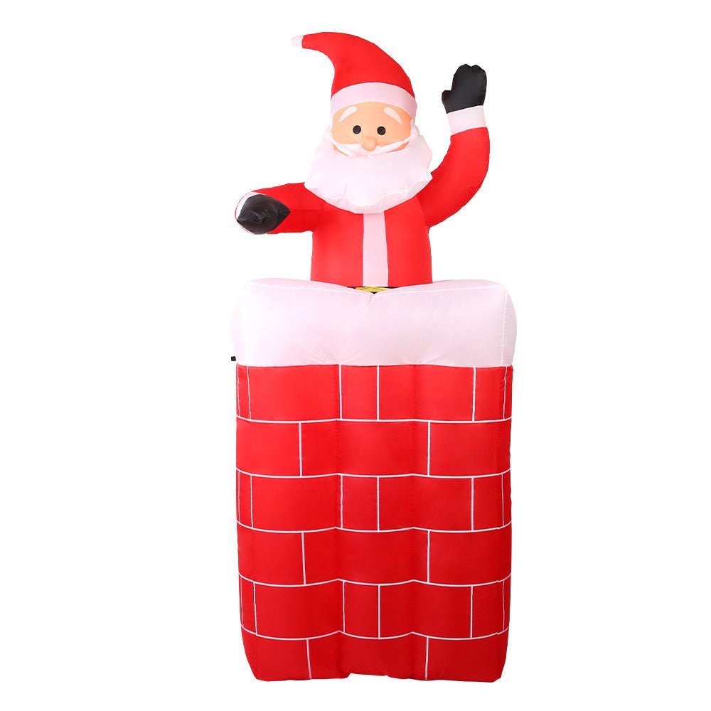 Inflatable pop-up Santa chimney in a front garden