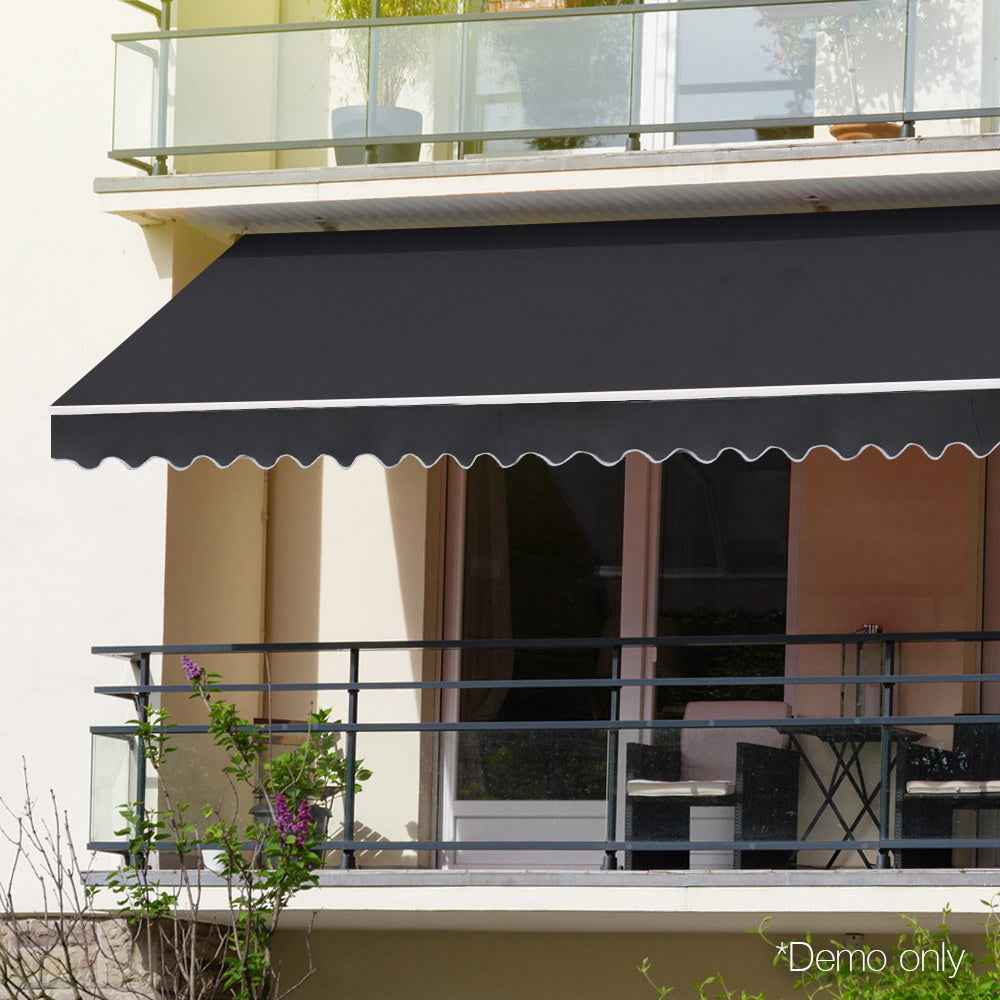 Folding arm awning shading a shopfront