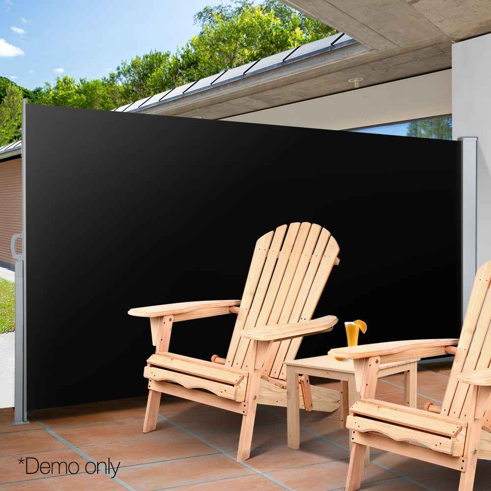 Black retractable side awning extended for privacy