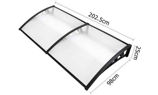 Window awning shielding a window from rain
